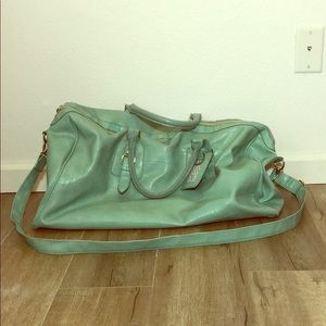 Steve Madden teal duffel bag